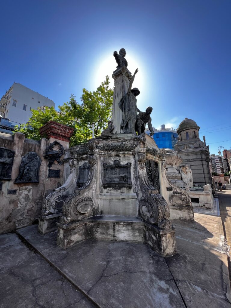 "Alt text: Explore the eerie beauty of Recoleta Cemetery in Buenos Aires, Argentina, featuring elaborate mausoleums, intricate sculptures, and rich historical significance. Dive into the cultural and architectural wonders of this iconic landmark in South America."
